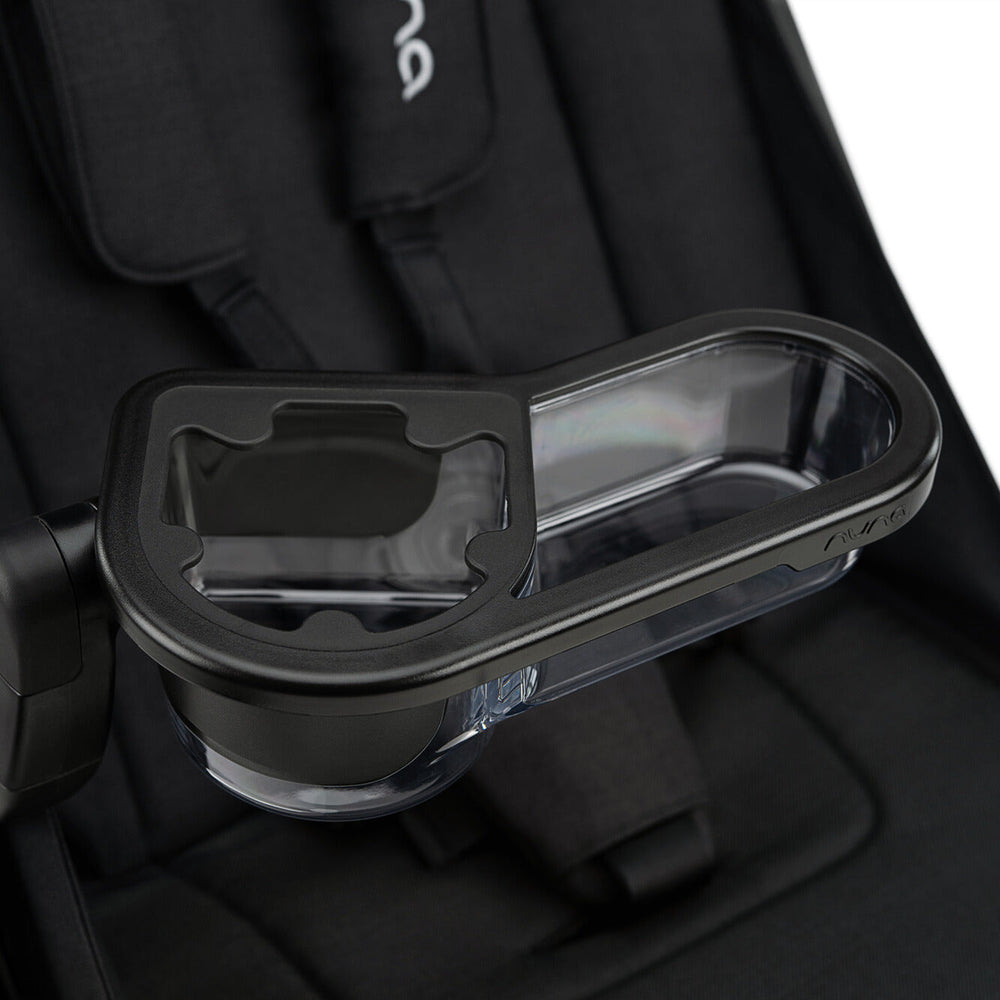 NUNA TRVL™ series stroller child tray | Caviar
