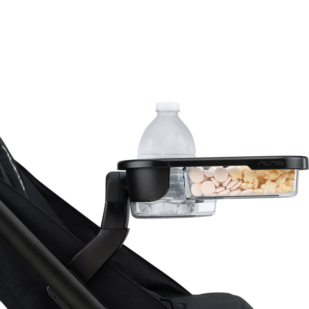 NUNA TRVL™ series stroller child tray | Caviar