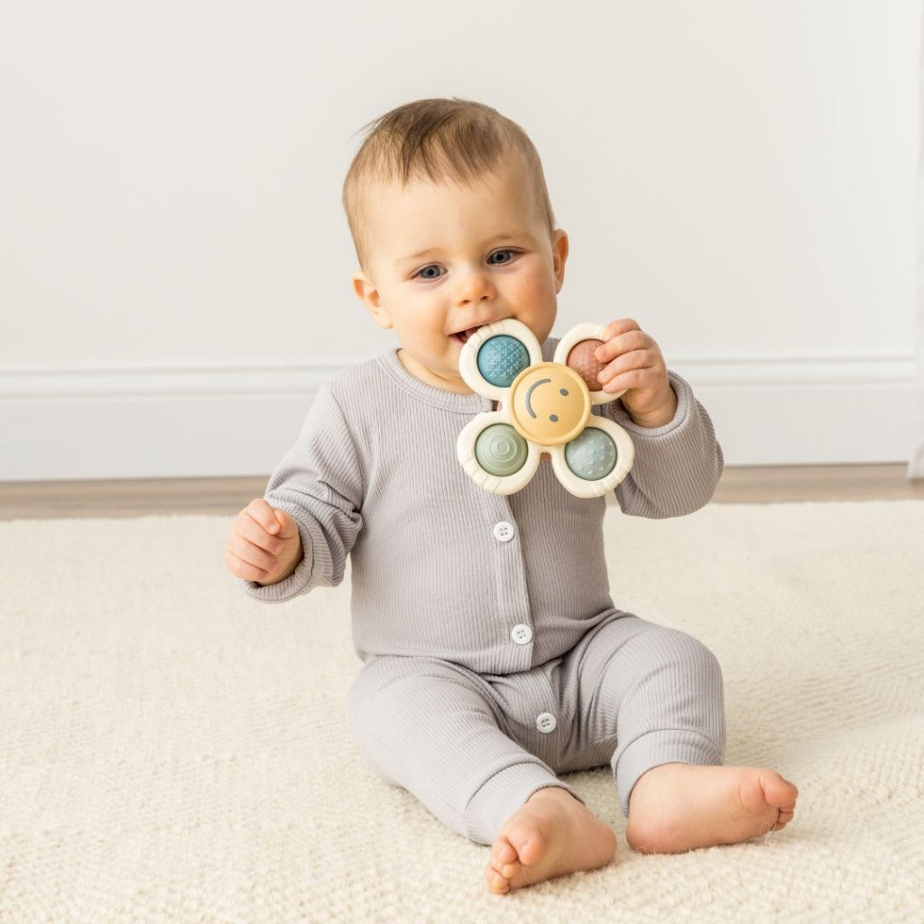 Itzy Pop & Whirl Sensory Toy | Smile