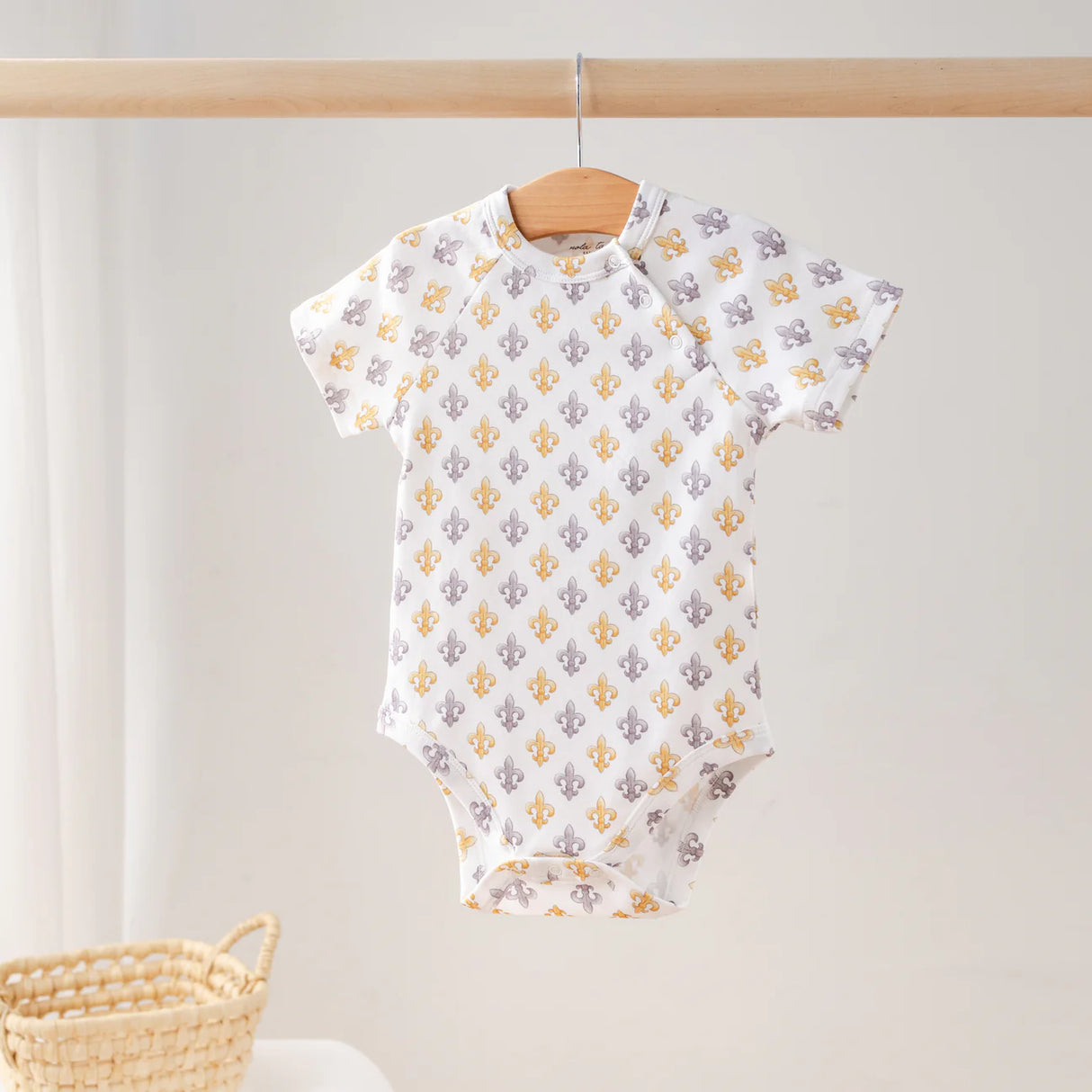 Nola Tawk Black and Gold Fleur de Lis Organic Cotton Onesie