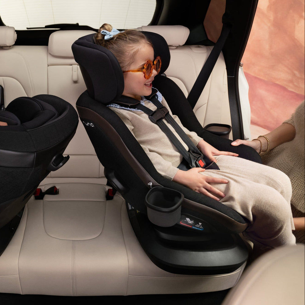NUNA REVV Maxx Rotating Convertible Car Seat with cupholder