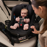 NUNA REVV Maxx Rotating Convertible Car Seat with cupholder