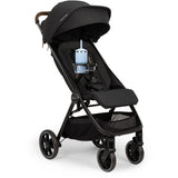NUNA TRVL™ series stroller child tray | Caviar